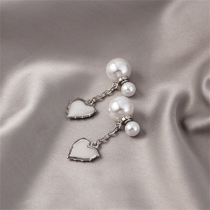 Pearl and Silver-Plated Heart Drop Ear Jackets, silver drop earrings for women, vintage-inspired design, side view
