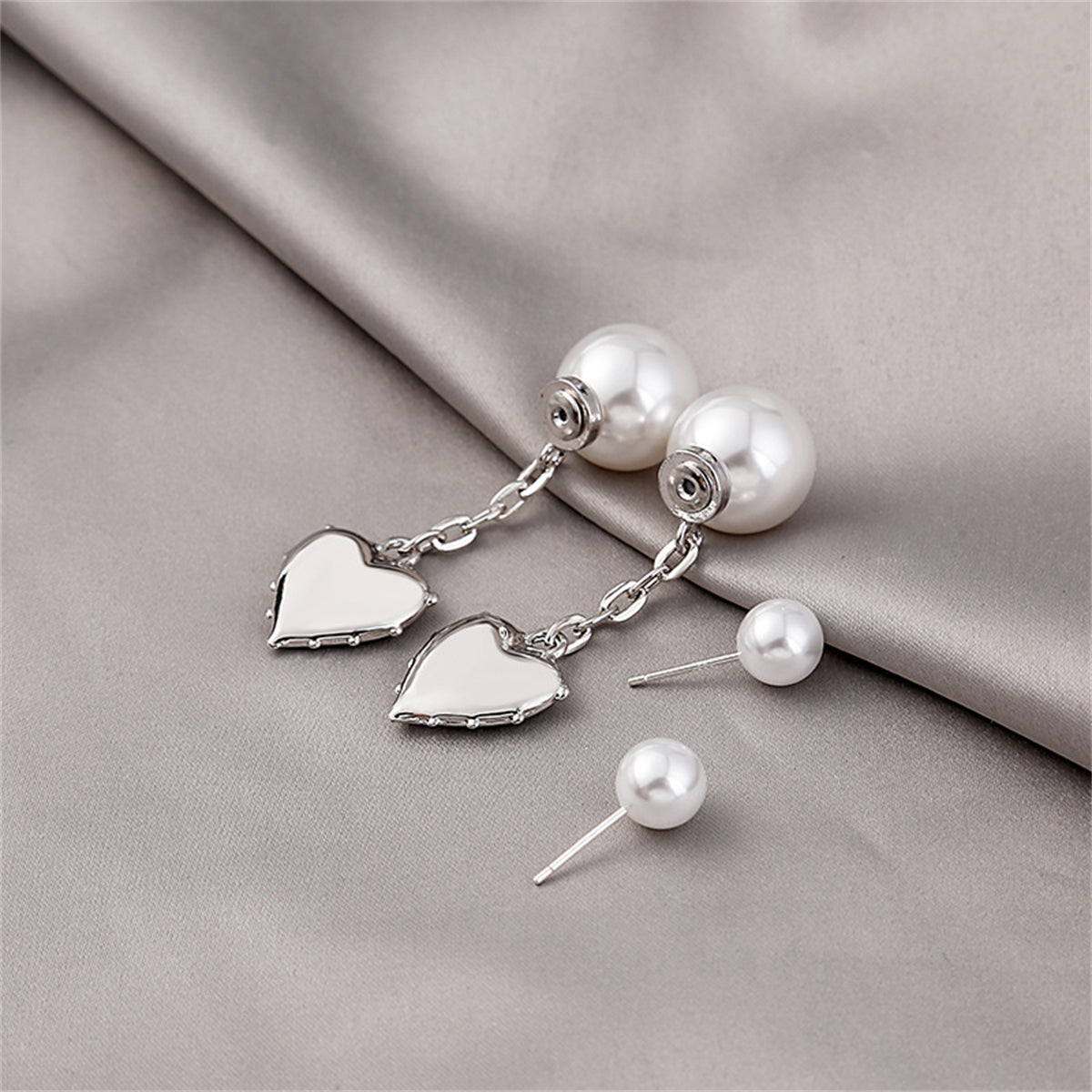 Pearl and Silver-Plated Heart Drop Ear Jackets, silver drop earrings for women, vintage-inspired design, detail close-up