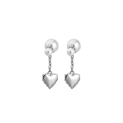 Pearl and Silver-Plated Heart Drop Ear Jackets, silver drop earrings for women, vintage-inspired design, styled look
