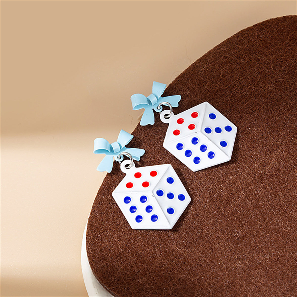 White Enamel and Silver-Plated Bow Dice Drop Earrings, silver drop earrings for women, everyday style, side view