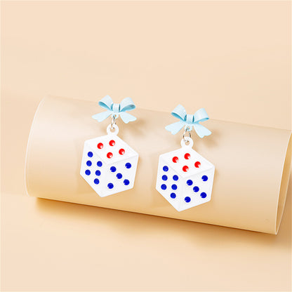 White Enamel and Silver-Plated Bow Dice Drop Earrings, silver drop earrings for women, everyday style, detail close-up