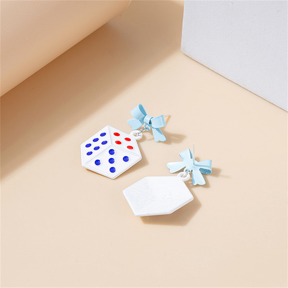 White Enamel and Silver-Plated Bow Dice Drop Earrings, silver drop earrings for women, everyday style, lifestyle look