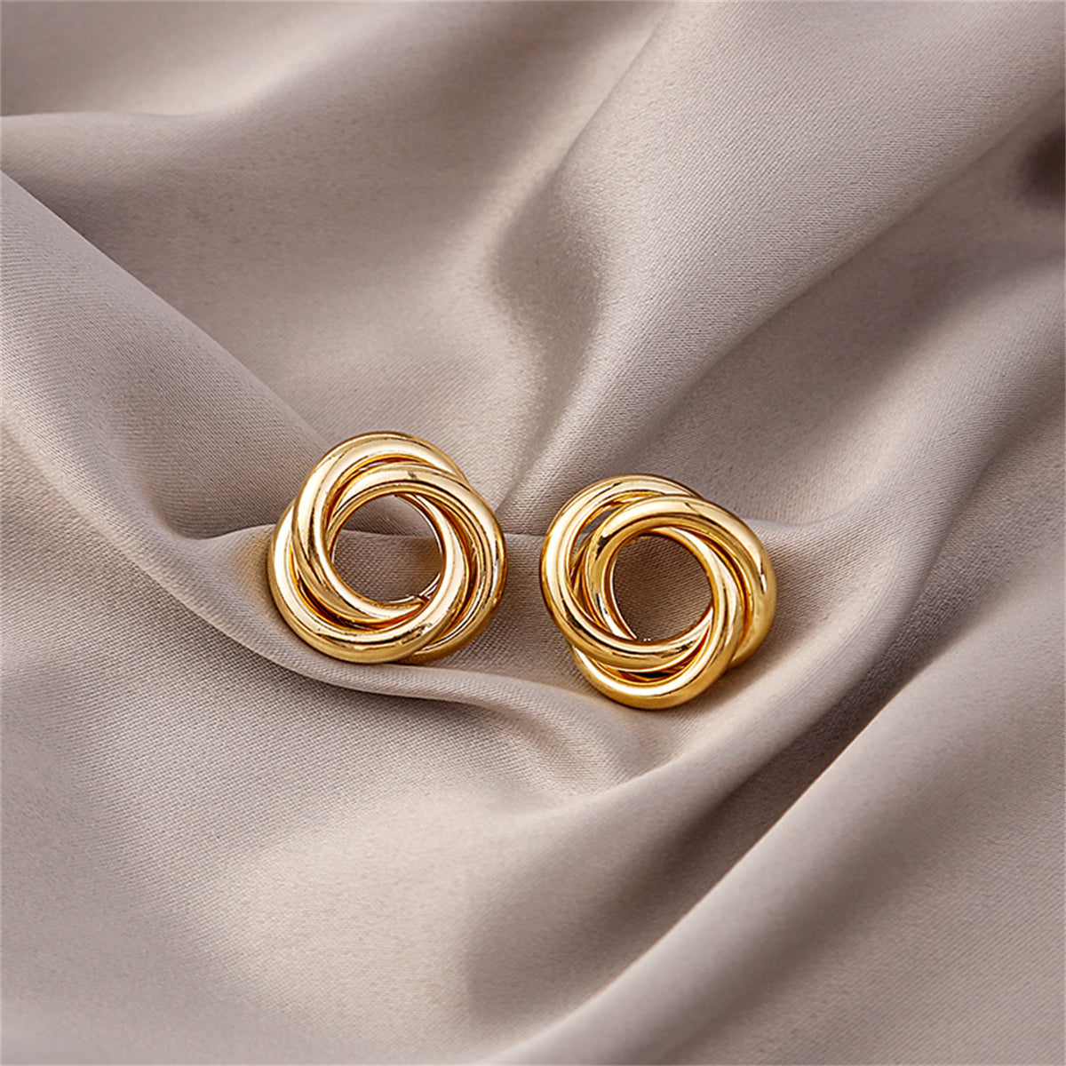 18K Gold-Plated Interlocked Circle Stud Earrings, gold stud earrings for women, botanical inspired, front view
