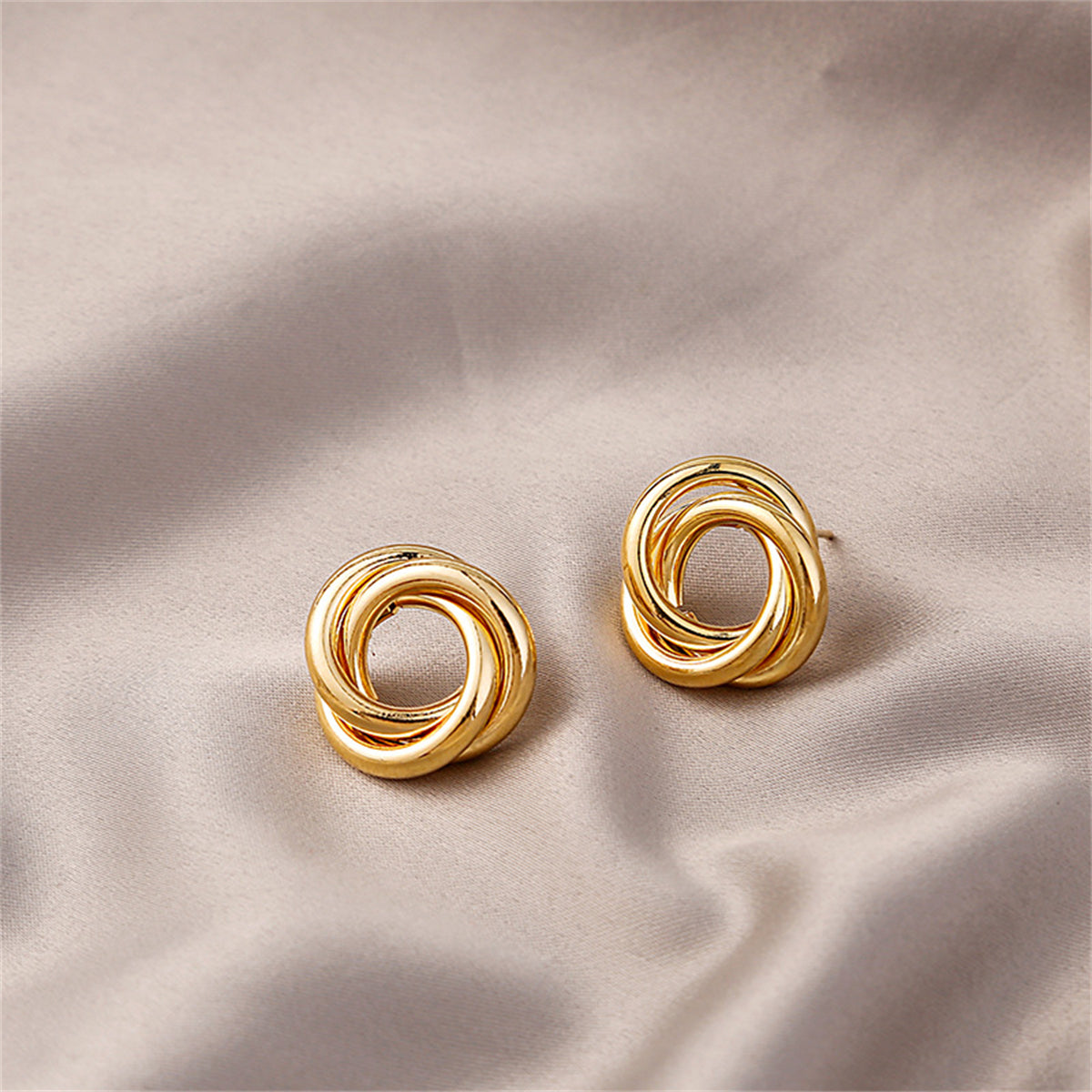 18K Gold-Plated Interlocked Circle Stud Earrings, gold stud earrings for women, botanical inspired, detail close-up