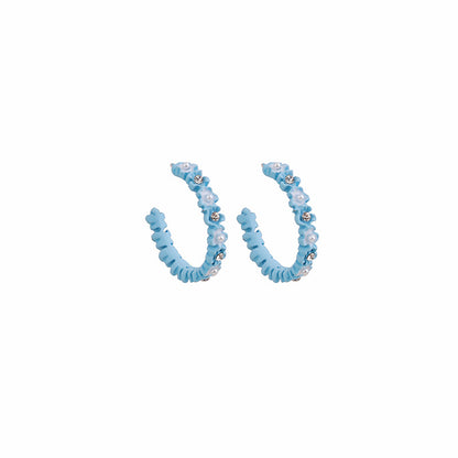Pearl and Cubic Zirconia Blue Flower Huggie Earrings, huggie earrings, vintage-inspired design, side view