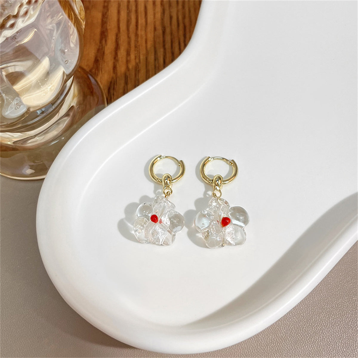 Clear Resin and 18K Gold-Plated Flower Huggie Earrings, gold huggie earrings, vintage-inspired design, lifestyle look