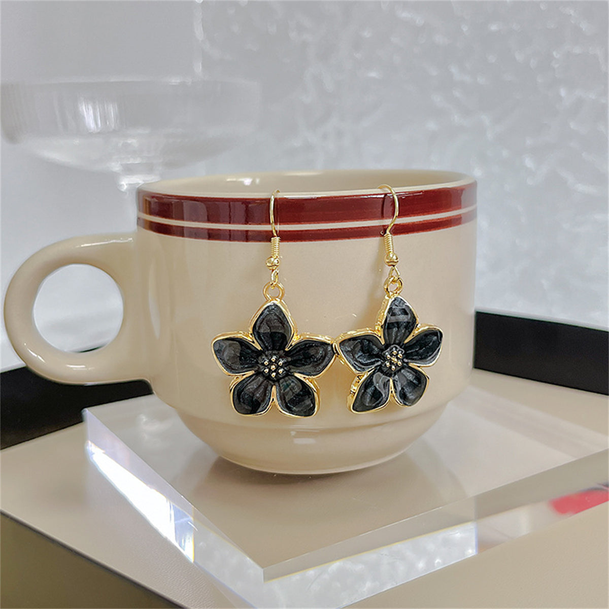 Black Enamel and 18K Gold-Plated Flower Drop Earrings, gold drop earrings for women, vintage-inspired design, front view