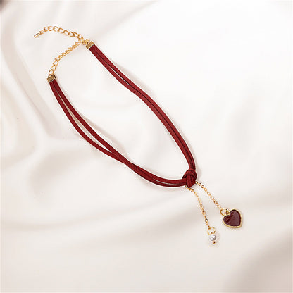 Pearl and Red Nylon 18K Gold-Plated Heart Tassel Necklace, gold pendant necklace for women, detail close-up