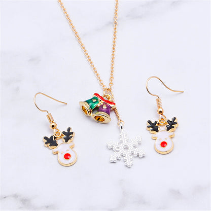 White and 18K Gold-Plated Reindeer Earrings and Snowflake Pendant Necklace, gold drop earrings for women, side view