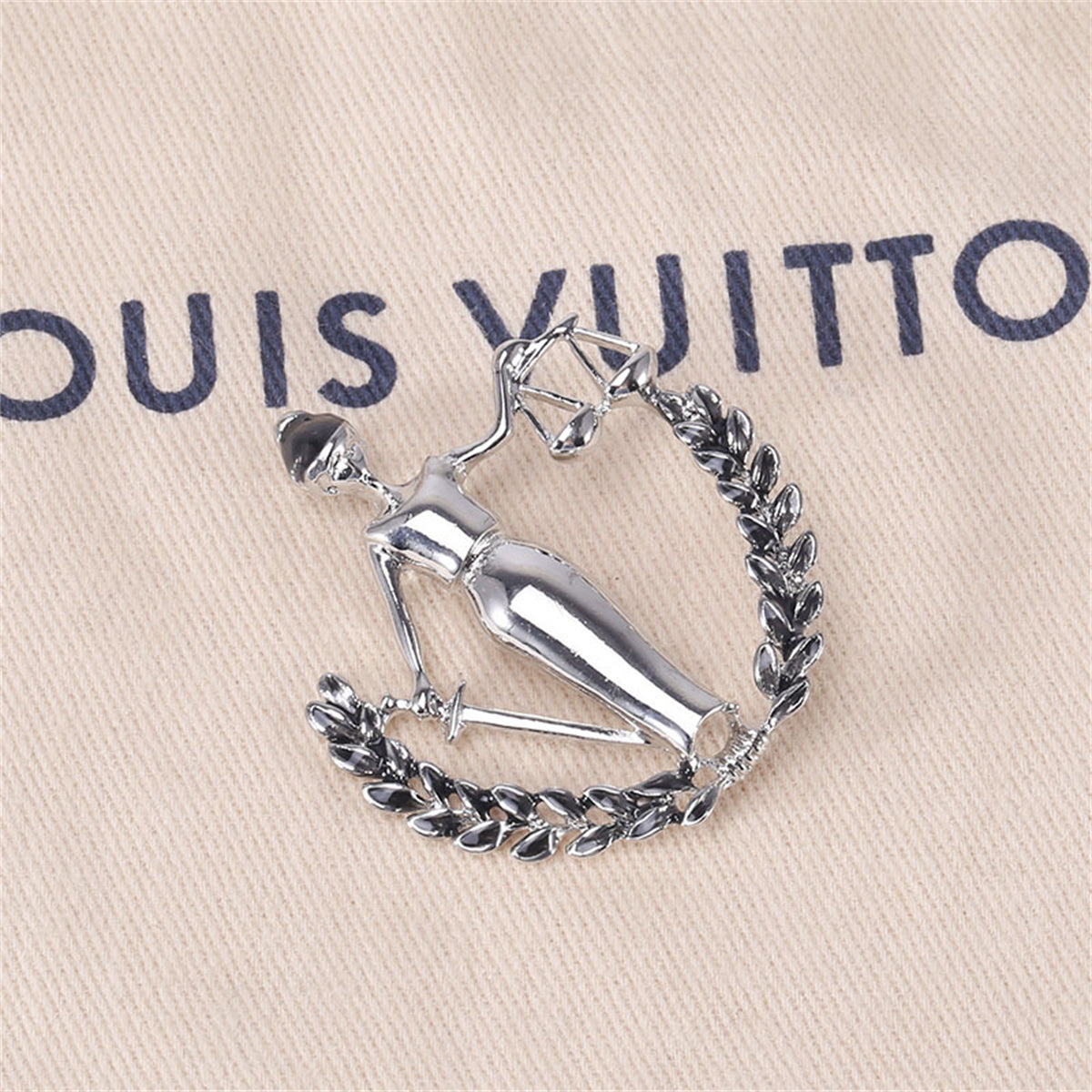 Black Enamel and Silver-Plated Libra Figure Brooch, silver brooch pin, everyday style, front view