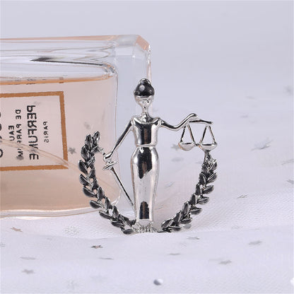 Black Enamel and Silver-Plated Libra Figure Brooch, silver brooch pin, everyday style, side view