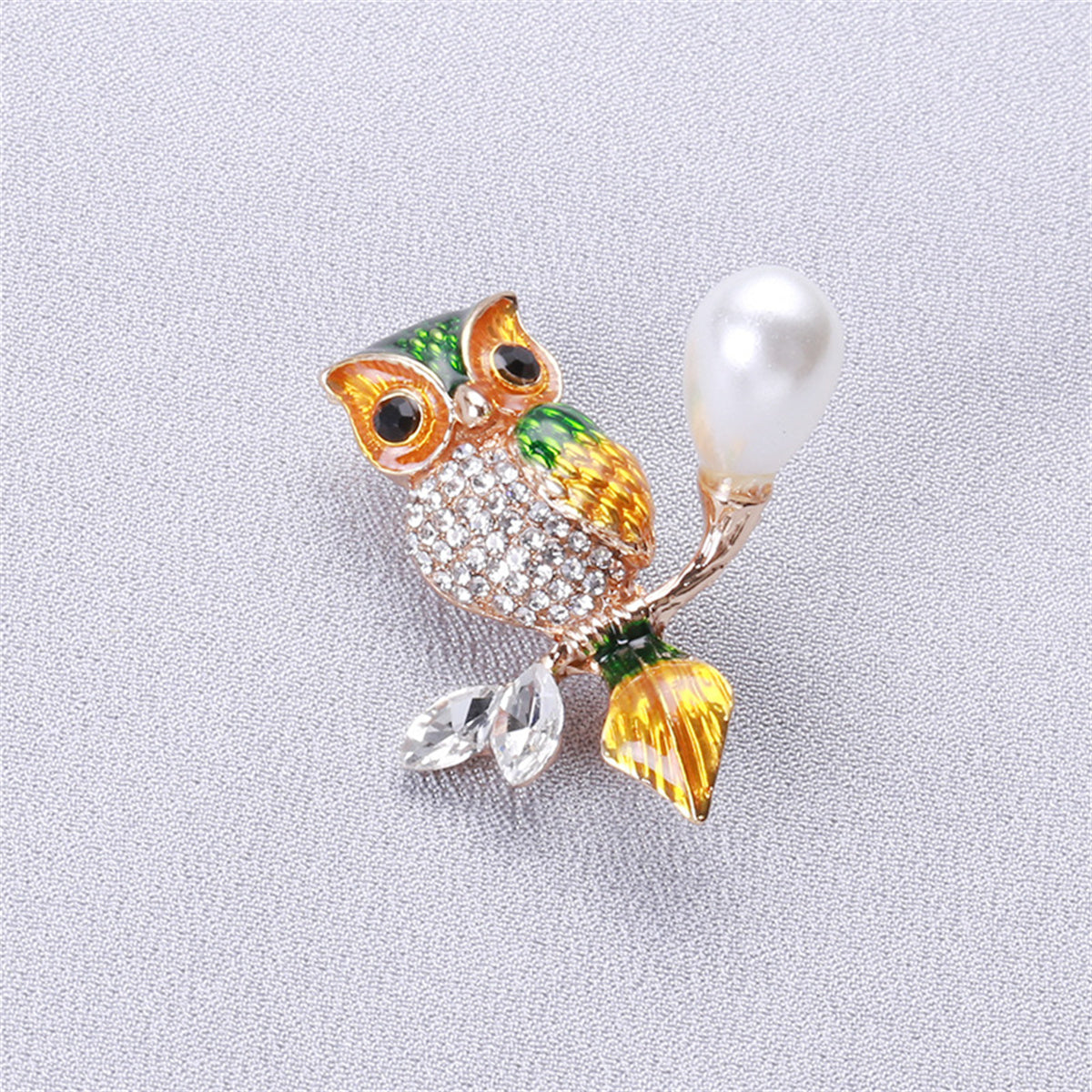Green Crystal and Cubic Zirconia Owl Brooch, brooch pin, botanical inspired, detail close-up