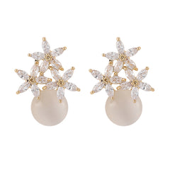 Stunning stud earrings with a gold-plated base, adorned with cateye and clear cubic zirconia flowers.