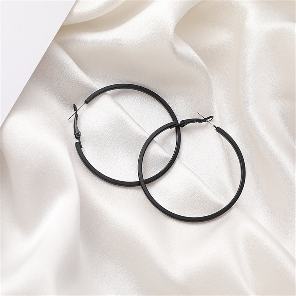 Black Hoop Earrings, dainty minimalist design, front view