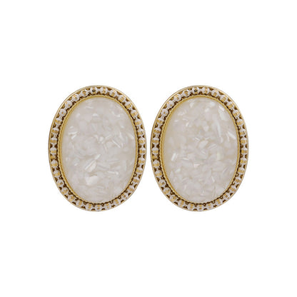 White Resin and 18K Gold-Plated Oval Stud Earrings, gold stud earrings for women, dainty minimalist design, detail close-up