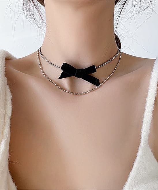Cubic Zirconia and Silver-Plated Bow Layered Necklace, silver pendant necklace for women, vintage-inspired design, front view
