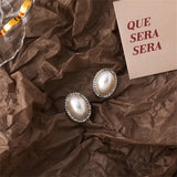 Cubic Zirconia & Pearl Oval Halo Stud Earrings