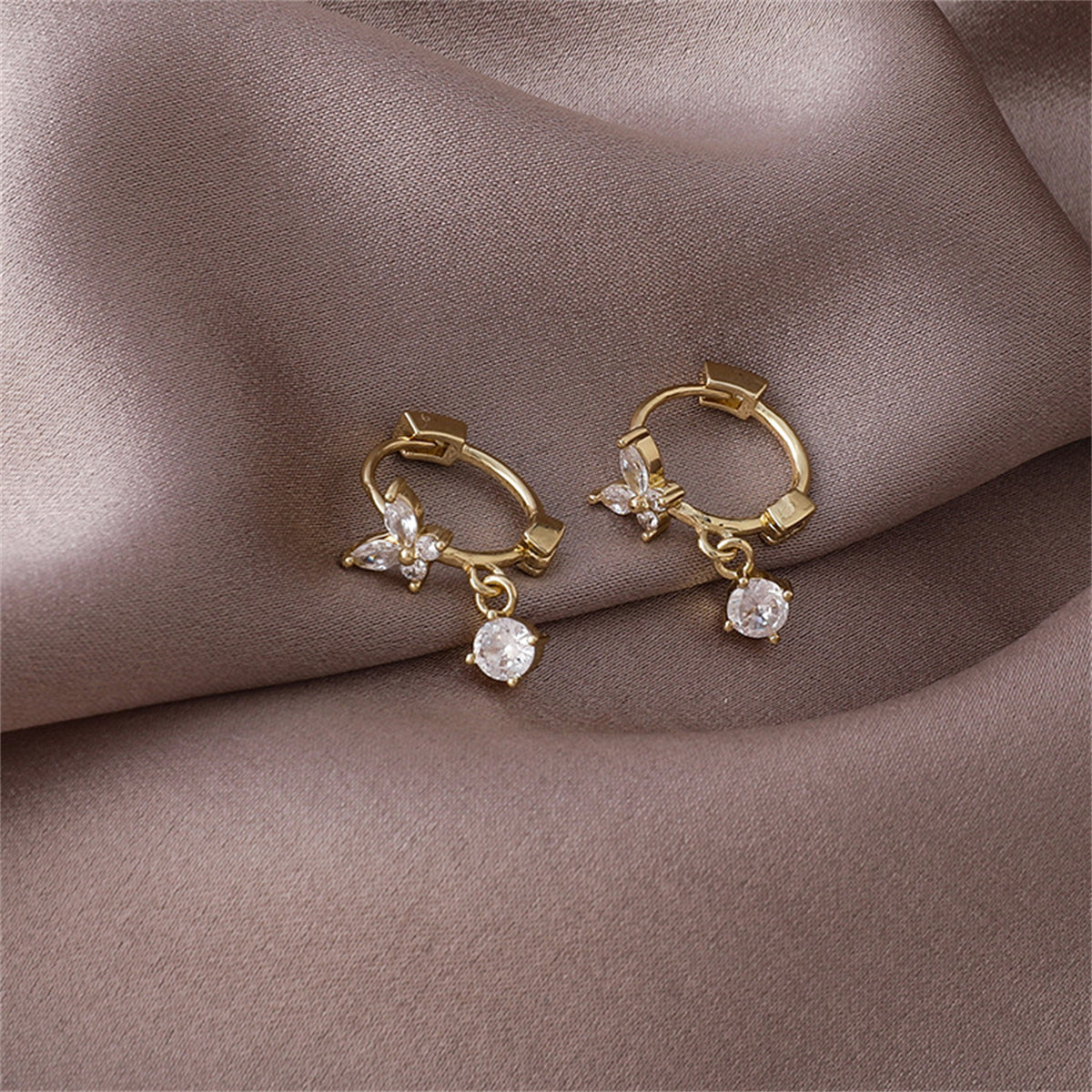Cubic Zirconia and 18K Gold-Plated Butterfly Huggie Earrings, gold huggie earrings, dainty minimalist design, front view