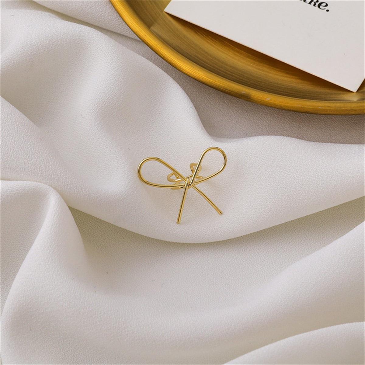18K Gold-Plated Bow Ear Cuff, gold stud earrings for women, vintage-inspired design, detail close-up