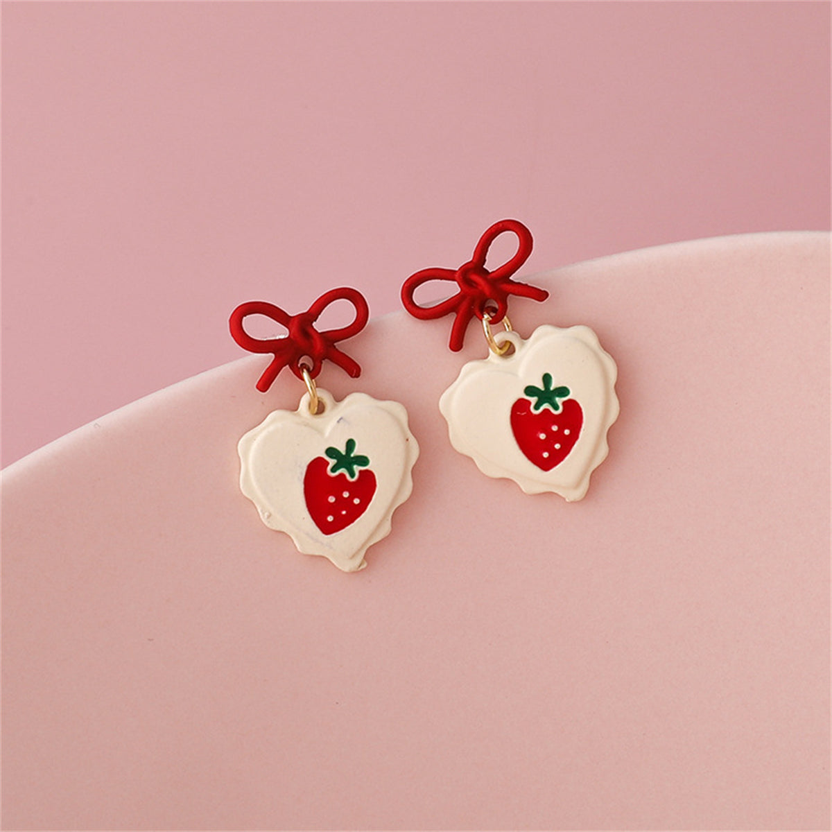 Red Enamel and 18K Gold-Plated Bow Strawberry Drop Earrings, gold drop earrings for women, botanical inspired, side view