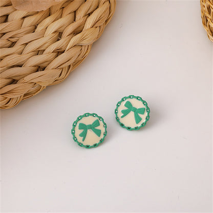 Green and White Bow Stud Earrings, stud earrings for women, vintage-inspired design, front view