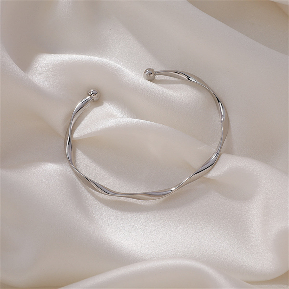 Silver-Plated Curved Waves Cuff, silver bracelet for women, vintage-inspired design, front view