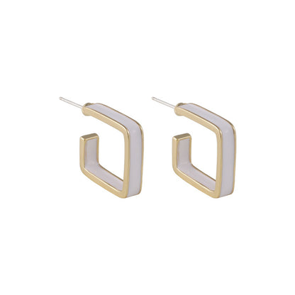 White Enamel and 18K Gold-Plated Open Square Huggie Earring, gold huggie earrings, everyday style, detail close-up