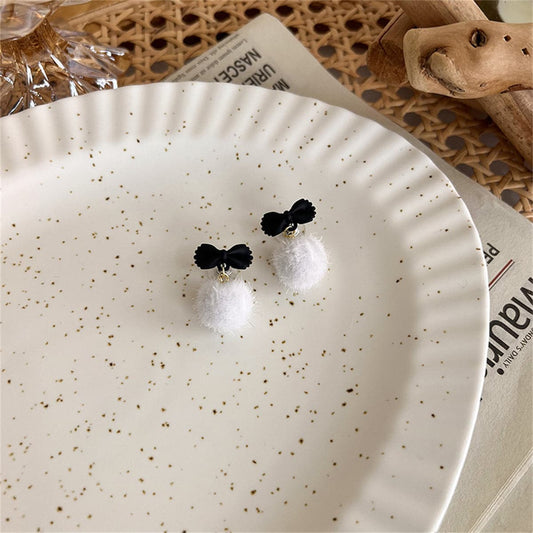 Black Enamel and White Pom-Pom Bow Drop Earrings, drop earrings for women, vintage-inspired design, front view