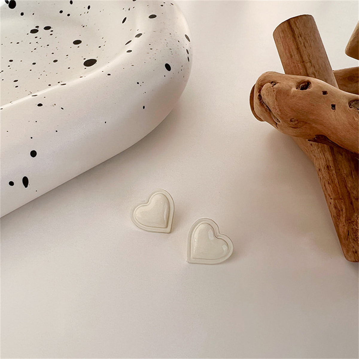White Heart Stud Earrings, stud earrings for women, vintage-inspired design, side view