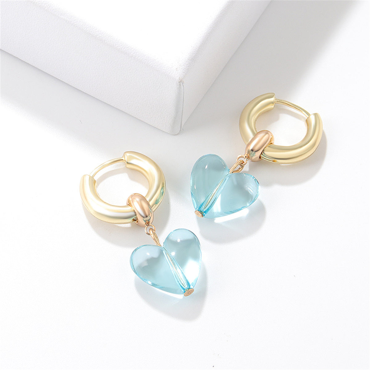 Light Blue Crystal and 18K Gold-Plated Heart Huggie Earrings, gold huggie earrings, botanical inspired, front view
