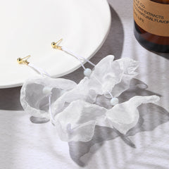Stunning three-petal white flower earrings with gold-plated hooks, ideal for elevating your style for any event.
