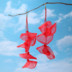 Elegant red flower-shaped earrings featuring gold hooks, perfect for enhancing your outfit with a vibrant and stylish flair.
