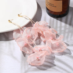 Pink polyester five-petal drop earrings with gold-plated hooks, elegantly designed for a stylish accessory choice.