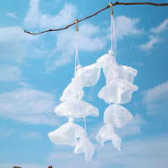 Beautiful white polyester earrings shaped like flowers, adorned with gold-plated hooks for a chic and elegant look.