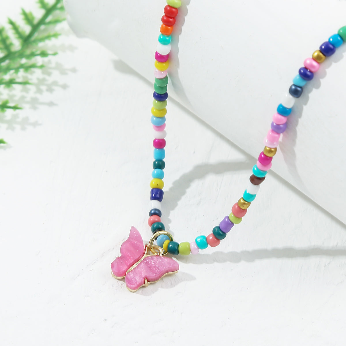 Pink Acrylic and Red Multicolor Howlite Butterfly Pendant Necklace, pendant necklace for women, front view