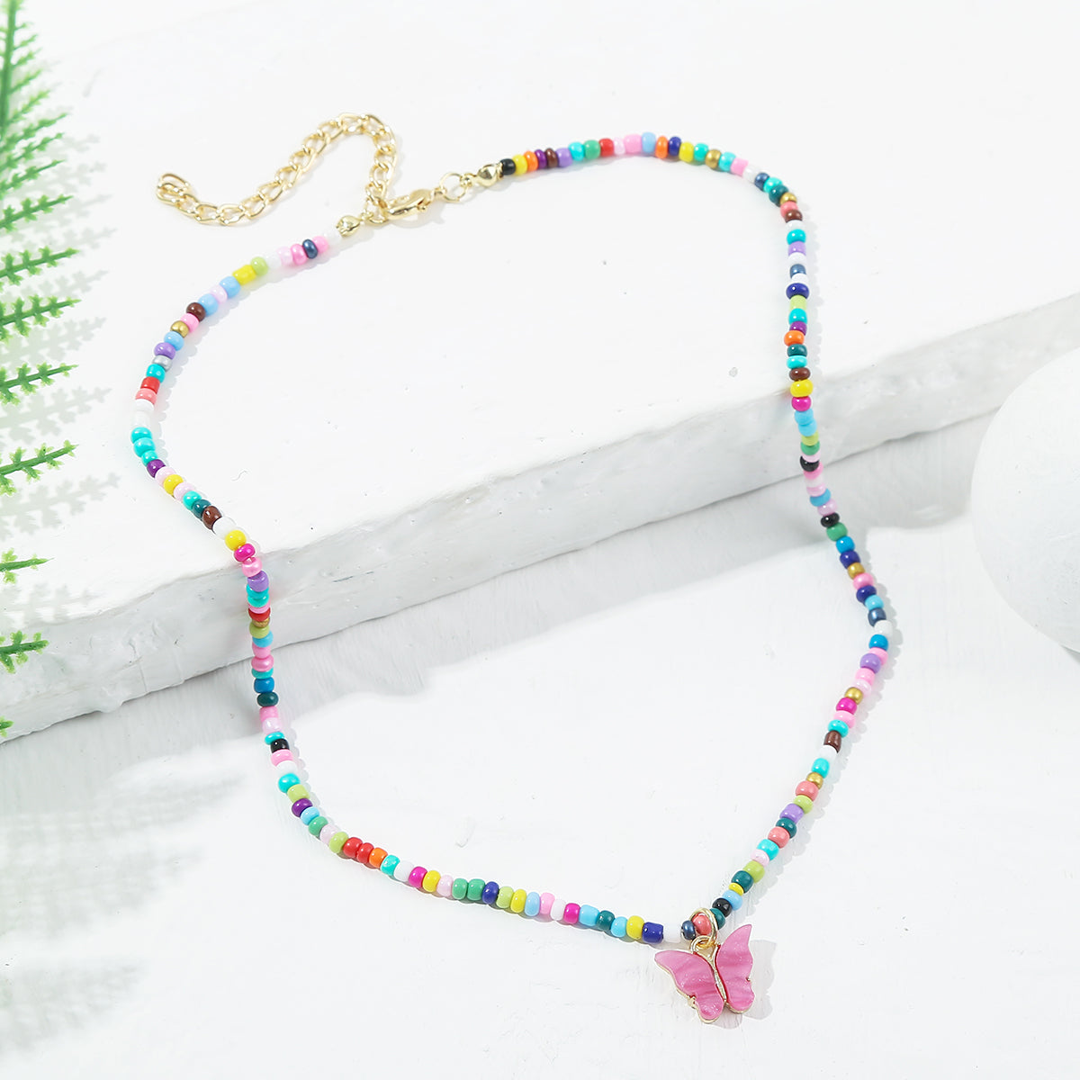 Pink Acrylic and Red Multicolor Howlite Butterfly Pendant Necklace, pendant necklace for women, side view