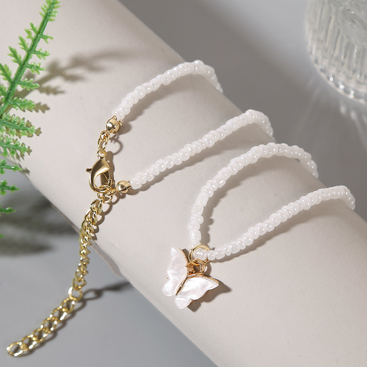 White and Howlite Butterfly Beaded Pendant Necklace, pendant necklace for women, dainty minimalist design, side view