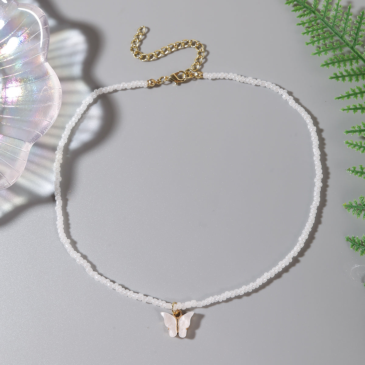 White and Howlite Butterfly Beaded Pendant Necklace, pendant necklace for women, dainty minimalist design, lifestyle look