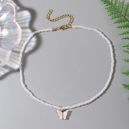 White and Howlite Butterfly Beaded Pendant Necklace, pendant necklace for women, dainty minimalist design, lifestyle look