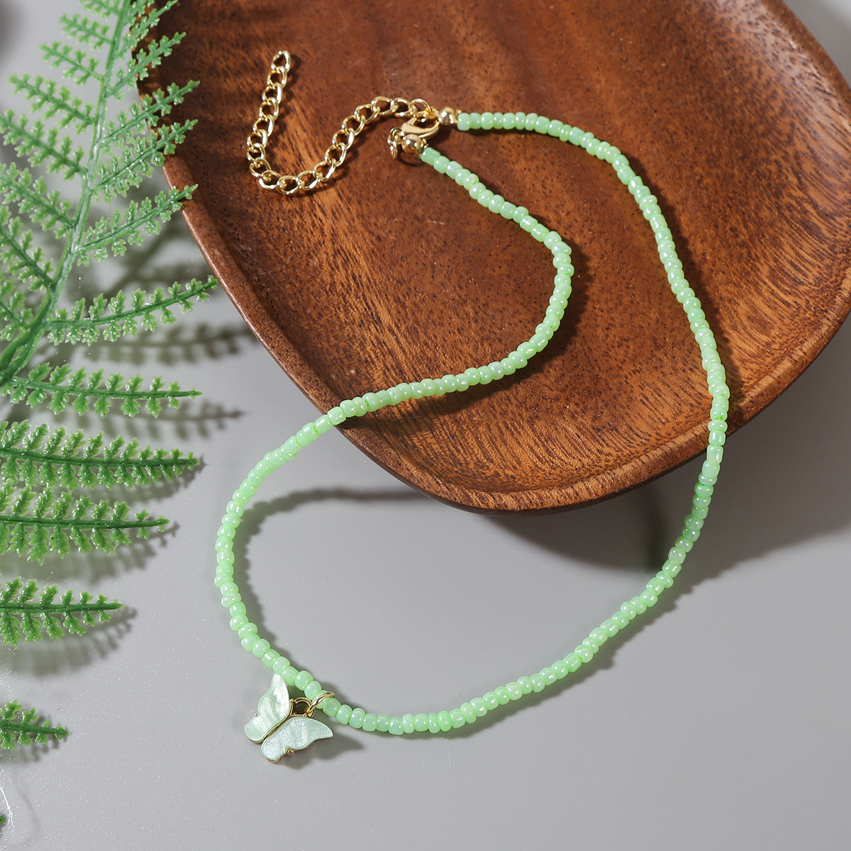 Green Howlite and 18K Gold-Plated Butterfly Pendant Necklace, gold pendant necklace for women, botanical inspired, side view
