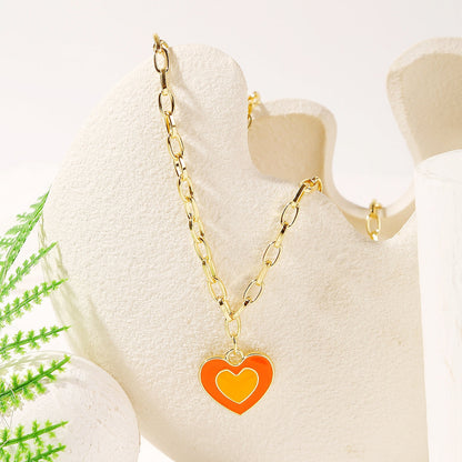 Orange Enamel and 18K Gold-Plated Heart Pendant Necklace, gold pendant necklace for women, lifestyle look