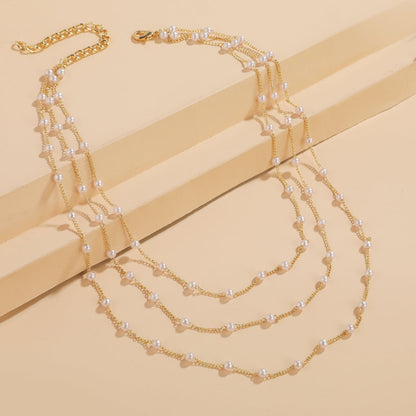 Pearl and 18K Gold-Plated Layered Station Necklace, gold pendant necklace for women, botanical inspired, side view