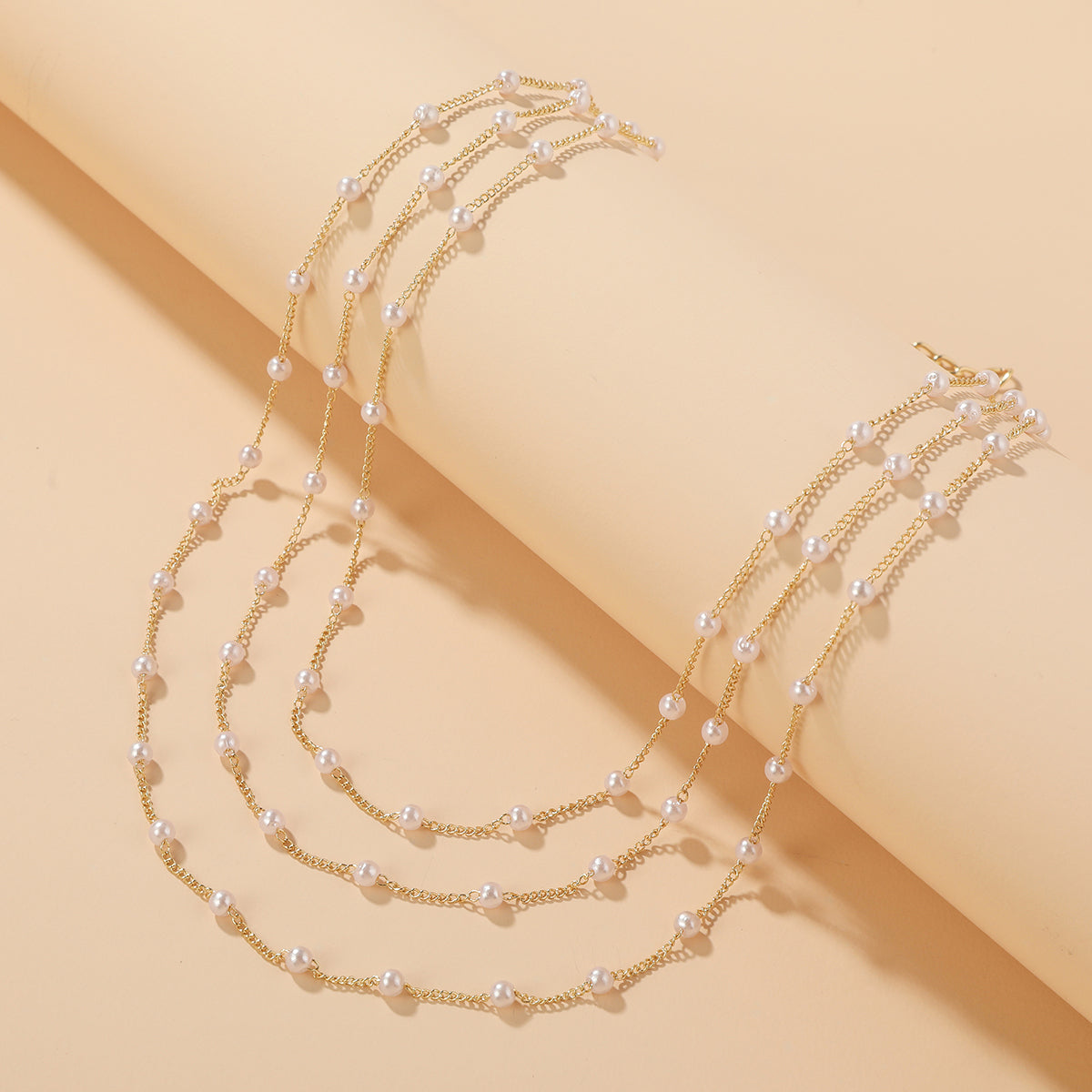 Pearl and 18K Gold-Plated Layered Station Necklace, gold pendant necklace for women, botanical inspired, detail close-up