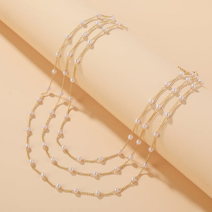 Pearl and 18K Gold-Plated Layered Station Necklace, gold pendant necklace for women, botanical inspired, detail close-up
