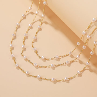 Pearl and 18K Gold-Plated Layered Station Necklace, gold pendant necklace for women, botanical inspired, lifestyle look