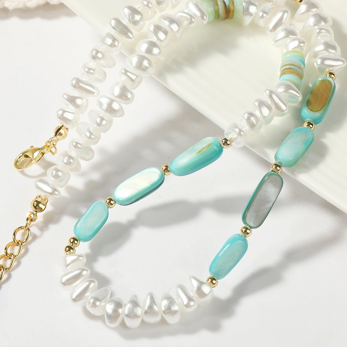 Pearl and Resin Shell 18K Gold-Plated Beaded Necklace, gold pendant necklace for women, botanical inspired, detail close-up