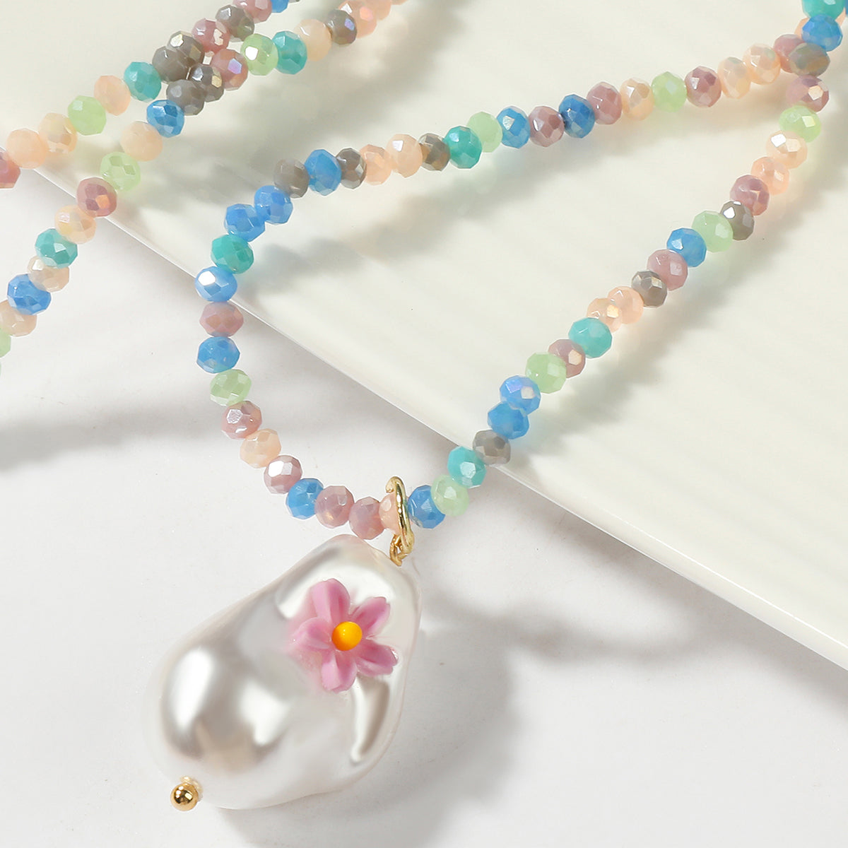 Pearl and Blue Acrylic 18K Gold-Plated Flower Pendant Necklace, gold pendant necklace for women, everyday style, side view