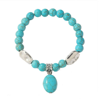 Turquoise and Silver-Plated Oval Charm Stretch Bracelet, silver bracelet for women, vintage-inspired design, front view