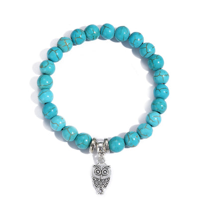 Turquoise and Silver-Plated Owl Charm Stretch Bracelet, silver bracelet for women, everyday style, front view