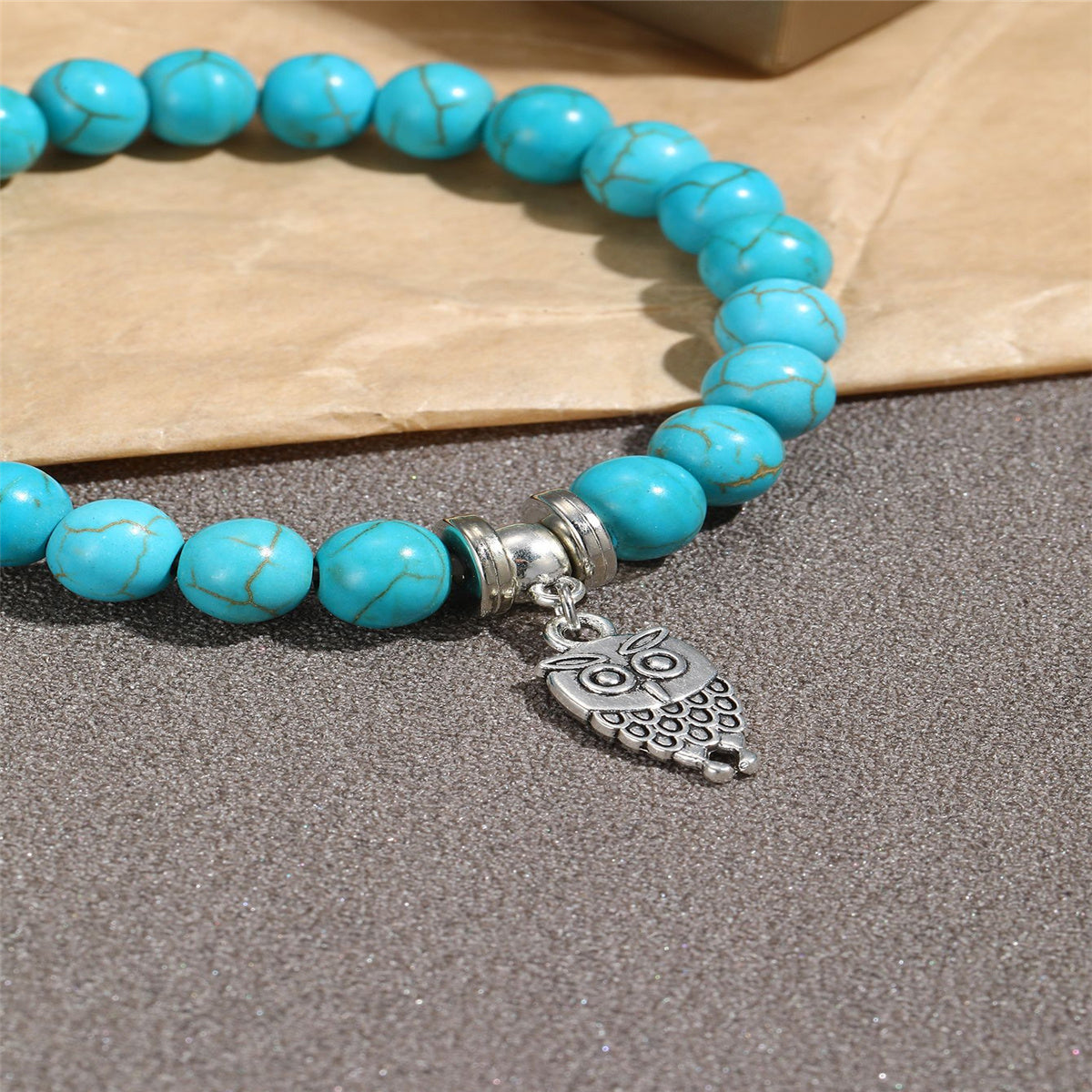 Turquoise and Silver-Plated Owl Charm Stretch Bracelet, silver bracelet for women, everyday style, detail close-up